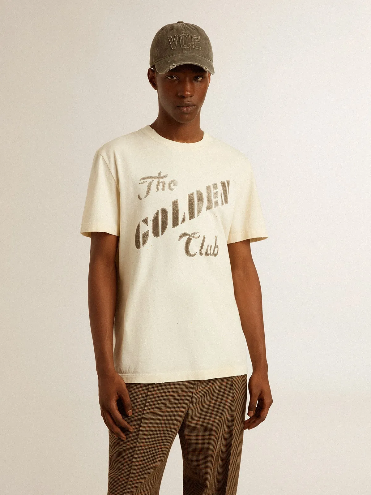 Men's aged white cotton T-shirt with gold print