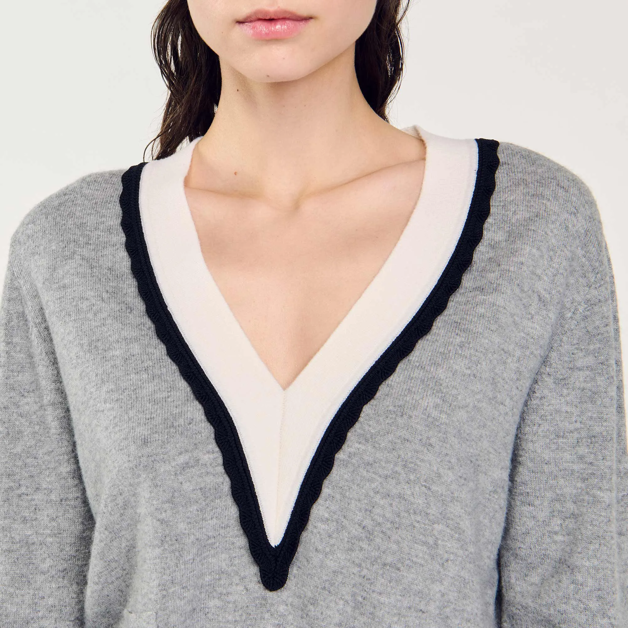 Sweater with contrasting deep V-neck